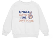 a white sweatshirt with the words uncle says i'm awesome and a thumbs up