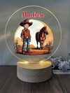 a wooden stand with a picture of a boy and a horse on it