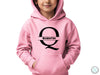 a young boy wearing a pink hoodie with the letter q on it