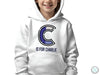 a young boy wearing a white hoodie with the c is for charlie on it