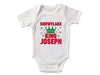 a white baby bodysuit with the words snowflake king joseph on it