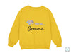 a yellow sweatshirt with the word germa printed on it