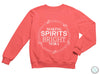 a pink sweatshirt that says making spirits bright nora